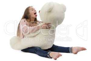 Photo of naughty teenage girl with teddy bear
