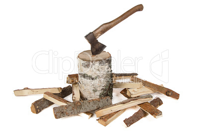 Image of axe in the stump and woods