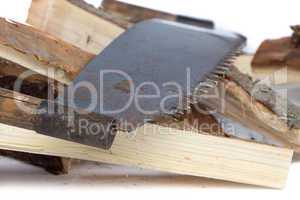 Image of handsaw and birch woods