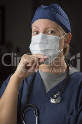 Female Doctor or Nurse Wearing Protective Face Mask