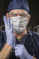 Determined Looking Doctor or Nurse with Protective Wear and Stet
