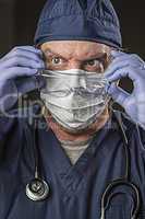 Determined Looking Doctor or Nurse with Protective Wear and Stet