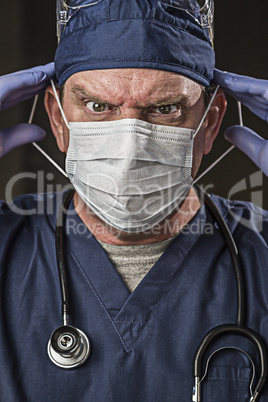 Determined Looking Doctor or Nurse with Protective Wear and Stet