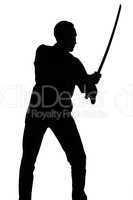 Silhouette of young man with sword