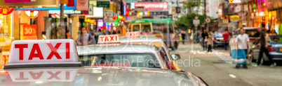 HONG KONG - MAY 11: Taxis on city streets on May 11, 2014 in Hon