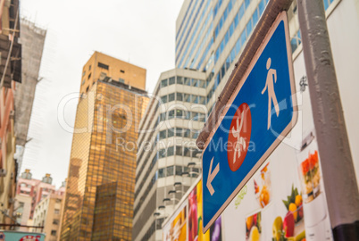 HONG KONG - MAY 6, 2014: Hong Kong subway sign with skyline on a