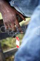Hand of an African with car keys