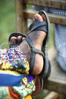 Feet of an African man resting