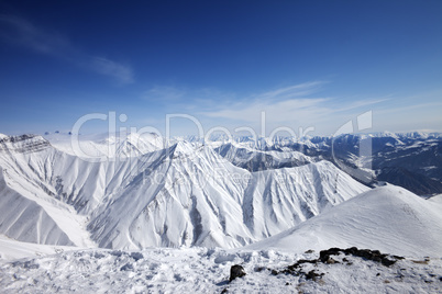 Snowy mountains at sun day