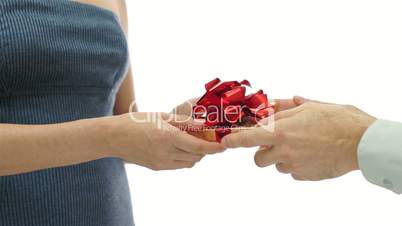 Man Gives Woman Gift on Knees