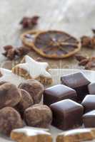 Pralines of Chocolate and marzipan and cinnamon stars