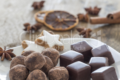 Pralines of Chocolate and marzipan and cinnamon stars