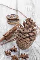 fir cone and decoration on white table
