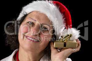 Middle-Aged Woman Holding Golden Gift