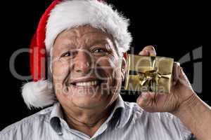 Old Gentleman With Red Hat Offering Golden Gift