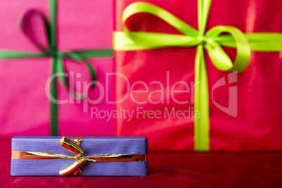 Blue gift with golden bowknot.