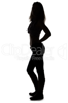 Silhouette of young woman full length