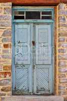 Blue weathered front door.