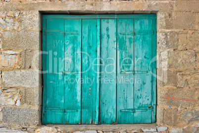 Green old window shutter.