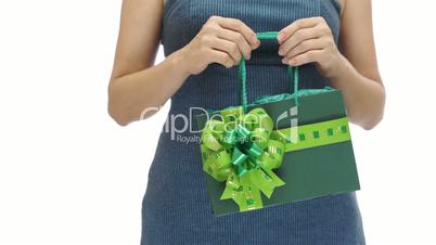Woman Holding Green Gift Bag