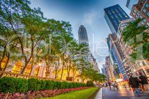 NEW YORK - MAY 17: Tourists relax on 5th Avenue near Public Libr