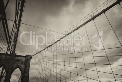 The Brooklyn Bridge. Close-up of Pylon and cables at summer suns