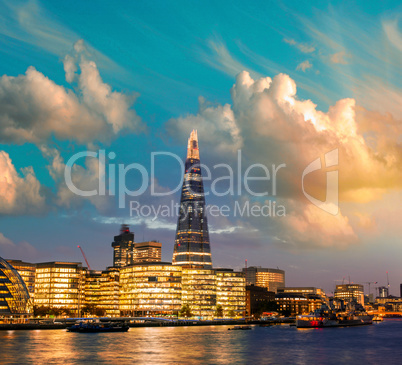 New London city hall at dusk, panoramic view from river.