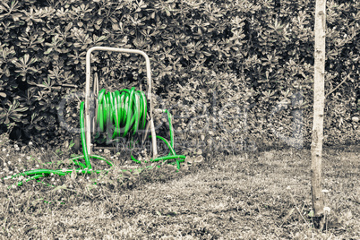 Green water pump in the garden