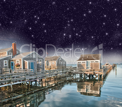 Waterfront with wooden homes and ocean