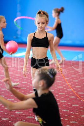 Girls exercising during gymnastics class