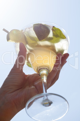 Female hand holding a cocktail