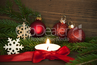 Winter or Christmas Background in Red Colors with Candle