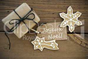 Joyeux Noël on a Banner with Christmas Decoration