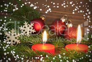 Red Burning Candles with Christmas Decoration
