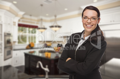 Mixed Race Young Woman Standing in Beautiful Custom Kitchen