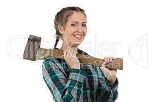 Photo of smiling woman with axe
