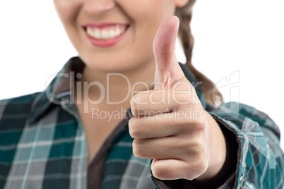 Image of woman showing thumb