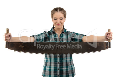 Image of young woman looking at hand saw