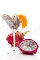 Wedges of a pitaya in a glass.