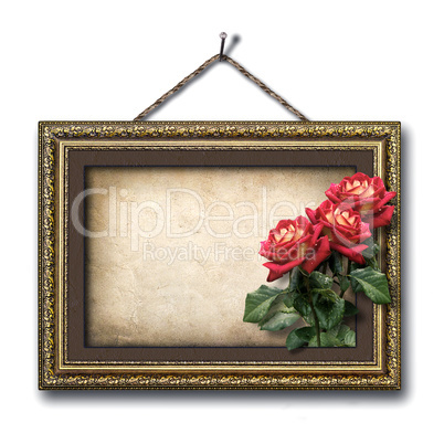 Vintage picture frame and a bouquet of red roses