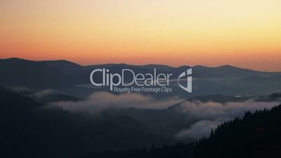Dawn Mist in the Forested Mountains. Time Lapse
