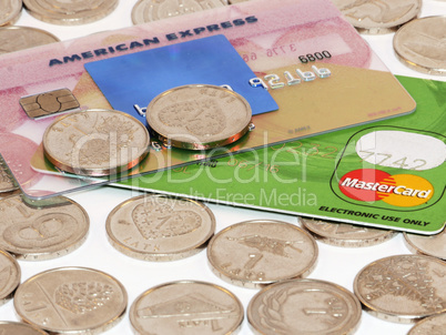 Bunch of coins with credit card