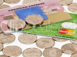 Bunch of coins with credit card