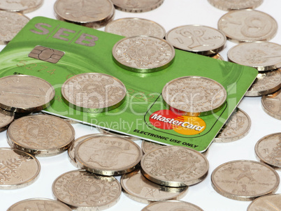 Bunch of coins with credit card