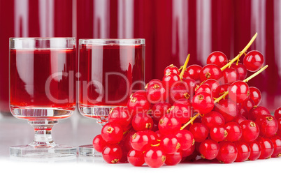 Red currants and liqueur in a glass