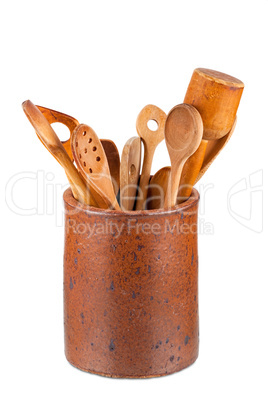 Clay pot with kitchen utensils