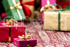 Red Present Among Other Gifts