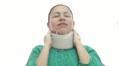 Woman With Neck Brace In Pain