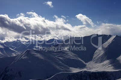 Silhouette of winter mountains at evening