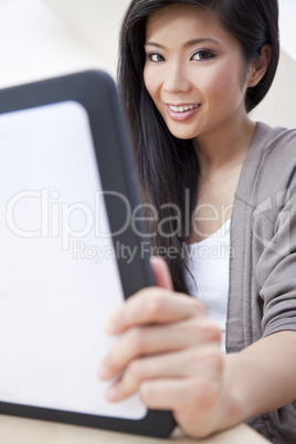 Beautiful Asian Chinese Woman Using Tablet Computer